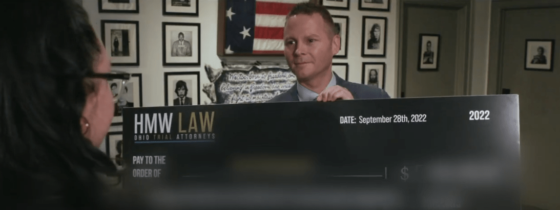 Attorney Brandon Henderson with client